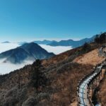 Joey Leong Instagram - It was 0 ℃ at mid mountain our hands and nose were frozen and it was demotivating to think that reaching the top of the mountain meant enduring much lower temperatures if fear stops you there, you wouldn’t know the top was much warmer, bathed in strong sunlight, and that the view was priceless ✧ 🧥🧤🧣👒🎧 from @universaltraveller_my #joeyleonginchengdu #joeyleongtravels