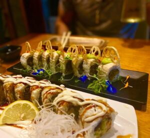 Johanna Braddy Instagram - Plant-based sushi and a stroll 🌱🍣Can’t say enough about @tanevegan Seriously amazing! Swipe to see the deliciousness! 
.
.
.
#veganfood #hawaii #plantbased #delicious #travel #datenight