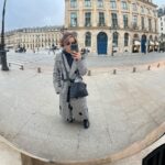 Johnna Dias-Watson Instagram - paris . styling: @nora_foley dress/belt: @karinabondlondon hair cut/color: @fmstyles_ coat: @sarahregensburger_official earrings: @aloeearrings