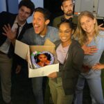 Jordan Claire Robbins Instagram – A throwback to the time when, delirious and sleep deprived in the middle of a cornfield, @theorossi and I came up with the genius idea to prank @tahirah_sharif by convincing the entire crew it was her birthday and forcing her to endure the always awkward birthday song and cake 🎂😬 yes we are children, no I don’t regret it, and yes it is, to this date, one of my proudest life moments…happy birthday Tahirah, sorry we broke your trust. #sorrynotsorry #escapethefieldmovie #tbt