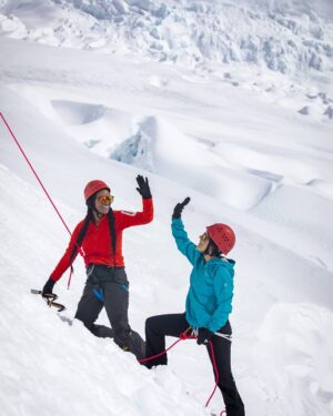 Joy Bryant Instagram - We arrive at a wall of ice and snow rising from the slope. “This is perfect,” @carolinewaregeorge says, before taking me off line. Perfect for what, 
I ask. “Ice climbing.” .
.
What? I’m not doing that!
.
.
As Paul and Nick rig the ropes, Caroline introduces @adavecalledyeti and I to the basics of ice climbing. “It’s all in the wrist,” she says of the axe. “Kick the wall like a soccer ball,” that’s where the crampons come in. .
.
But I wasn’t really getting it. My axes didn’t cut deep enough, my crampons were slipping, and I couldn’t get off the ground. I was over it already.
.
.
Caroline attaches herself to the belay line that will secure her climb and descent on the ice, with Paul as safety on the other end. .
.
She expertly cuts and kicks her way up to the top of the ice formation, and descends with the elegance of a spider on silk. “You’re next,” Paul tells me. What? .
.
“I’m not doing that!” I point to the wall. “I can’t do that! That’s crazy!” .
.
“Sure you can,” he laughs. .
.
Caroline ties the rope to my harness with a figure eight knot, before handing me two axes. “You got this, Joy.” I didn’t believe her one bit, but I went for it anyway. There was no other option; “can’t” is not in these people’s vocabulary.
.
.
To my surprise, I got off the ground… and kept going.
.
.
With Caroline coaching from below (“Push your hips into the ice before you swing!”) I danced my way up the wall. 
Push, swing, kick, kick! Push, swing, kick, kick!
.
.
As I made my way, all that mattered was the ice in front of me, and the path ahead. And I felt the great pleasure of doing what I’m supposed to be doing, the way I’m supposed to do it.
.
.
Flow on ice. And I never looked down. .
#LiveYourAdventure #EddieBauer
#NewZealand #FranzJosefGlacier 📸 @eliza_earle 
@eddiebauer
@newzeal2015
@ihprteam
#EBPartner