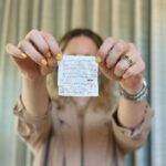 Judy Greer Instagram - I thrifted the blazer I’m wearing in the background and in the pocket was this karaoke song list. I hope the blazer owner had a magical night. I hope she sang her heart out and had so much fun she left this blazer at the bar and never went back for it. I also wonder if she actually got to sing all these songs. The list is so long. Was it a quiet night at the bar? Or did she have one of those private rooms where you can sing all night long. She was so prepared!