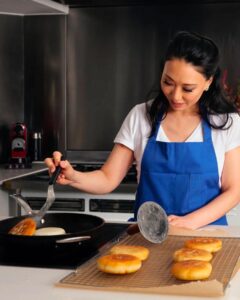 Judy Joo Instagram - Sharing my love in the @nytimes for the warm, gooey delight of Hotteok— a classic Korean street food snack, a flat donut stuffed sweet (or savory) fillings! I really engineered this dough (I’m a pastry chef!), and it is so easy to work with. The combination is various flours gives you that chewiness but crispy lightness that you want in Hotteok. From nostalgic street food to contemporary culinary innovations, the journey of this Korean pancake is as rich as its filling! Check out the full story at www.nytimes.com. Thanks for the love, NYT! 🥞🇰🇷 #Hotteok #NYTimes #Feature • • • • • #dessert #cinnamon #sugar #doughnuts #chef #korean #donuts #cheflife #korea #chefsofinstagram #cook #cooking #chefs #chefstalk #gastroart #chefslife #cuisine #foodart #instachef #donut