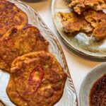 Judy Joo Instagram - Whip up these Mung Bean Pancakes for a traditional savoury treat. I have so many memories eating these totally addictive pancakes in Gwangjang market in Seoul. Packed with flavours from finely chopped cabbage kimchi, spring onions, and red chilli, these pancakes are a classic in Korean cooking. I like to add some pork for extra savouriness, and it’s all held together with blended mung beans for a crispy yet soft texture. The accompanying dipping sauce, a blend of soy sauce, vinegar, sesame oil, and gochugaru, adds the perfect tangy and spicy kick to complement the pancakes. Serve these pancakes hot with the special dipping sauce for a delicious fusion of flavours. Check out the full recipe and add a Korean twist to your pancake game – link in bio! • • • • #JudyJooKitchen #MungBeanPancake #KoreanFood #SavouryPancake #Kimchi #ChefLife #FoodBlog #InstaFood #FoodStagram #CookingAtHome #Homemade #RecipeOfTheDay #CulinaryJourney #FoodInspiration #Gourmet #AsianCuisine #Foodie #FoodLover #FoodPhotography