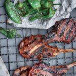 Judy Joo Instagram - Sweet-and-Spicy BBQ Lamb Chops! 🍖🌶️ These lamb chops are marinated in a blend of sake, gochujang, doenjang, mirin, and other savory umami packed ingredients. The result is a marinade full of complex rich flavors and aromatics. Let the lamb marinate for at least 4 hours – or better, overnight. Lamb is not a popular meat in Korea, but its gaminess goes really well with Korea’s strong flavors. Serve this dish up with some padron peppers and dinner is complete! For the full recipe and step-by-step guide, hit the link in my bio or go to Judyjoo.com 🍴 • • • • #chef #cheflife #koreanfood #bbqlambchops #grilling #instafood #foodie #recipeoftheday #lamb #sweetandspicy #yum #delicious #homemade #foodlover #foodpassion #gochujang #doenjang #foodculture #koreanbbq #korea #korean #koreanfoodmadesimple #judyjoo #chefsofinstagram