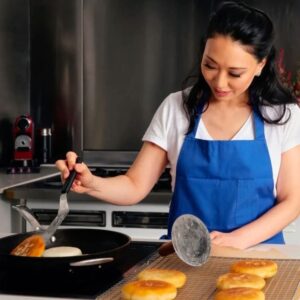 Judy Joo Instagram - Sharing my love in the @nytimes for the warm, gooey delight of Hotteok— a classic Korean street food snack, a flat donut stuffed sweet (or savory) fillings!  I really engineered this dough (I’m a pastry chef!), and it is so easy to work with.  The combination is various flours gives you that chewiness but crispy lightness that you want in Hotteok. 

From nostalgic street food to contemporary culinary innovations, the journey of this Korean pancake is as rich as its filling! Check out the full story at www.nytimes.com. Thanks for the love, NYT! 🥞🇰🇷 #Hotteok #NYTimes #Feature
•
•
•
•
•
#dessert #cinnamon #sugar #doughnuts #chef #korean #donuts #cheflife #korea #chefsofinstagram #cook #cooking #chefs #chefstalk #gastroart #chefslife #cuisine #foodart #instachef #donut