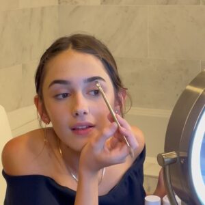 Julia Butters Instagram - At 13 years old, @julia_butters (Julia Butters) has already acted in two best picture-nominated films. Here’s #10Things with “The Fabelmans” actress ahead of the 95th Annual Academy Awards. ❤️ ⁣
 ⁣
1. All dressed up (with somewhere fabulous to go) on a night out in Hollywood. ⁣
2. A very proud brow moment.⁣
3. Julia’s must-have movie snacks. 🍿⁣
4. Quick fit check. ⁣
5. Bestie @mckennagraceful (Mckenna Grace) hyping Julia up.👯‍♀️⁣
6. Waiting on the chauffeur (aka dad).⁣
7. Is there a better  1? (Also dad.)⁣
8. “I love you” texts.⁣
9. A surprise on Sunset Boulevard. 🌇💫⁣
10. Reunited (with a “The Fabelmans” cast member!) and it feels so good.