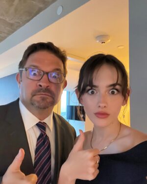 Julia Butters Instagram - At 13 years old, @julia_butters (Julia Butters) has already acted in two best picture-nominated films. Here’s #10Things with “The Fabelmans” actress ahead of the 95th Annual Academy Awards. ❤️ ⁣
 ⁣
1. All dressed up (with somewhere fabulous to go) on a night out in Hollywood. ⁣
2. A very proud brow moment.⁣
3. Julia’s must-have movie snacks. 🍿⁣
4. Quick fit check. ⁣
5. Bestie @mckennagraceful (Mckenna Grace) hyping Julia up.👯‍♀️⁣
6. Waiting on the chauffeur (aka dad).⁣
7. Is there a better  1? (Also dad.)⁣
8. “I love you” texts.⁣
9. A surprise on Sunset Boulevard. 🌇💫⁣
10. Reunited (with a “The Fabelmans” cast member!) and it feels so good.