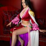 Julia Maggio Instagram – Kneel before me or be turned to stone! 🩷
Pirate Empress, Captain of the Kuja pirates, Warlord of the Sea – Boa Hancock
 📸: @roxcosplays 
My first One Piece cosplay! 🏴‍☠️☠️🩷
#anime #manga #cosplay #onepiece #boahancock #boahancockcosplay