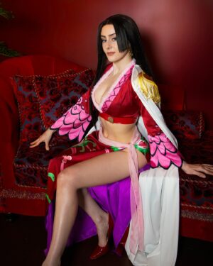 Julia Maggio Instagram - Kneel before me or be turned to stone! 🩷
Pirate Empress, Captain of the Kuja pirates, Warlord of the Sea - Boa Hancock
 📸: @roxcosplays 
My first One Piece cosplay! 🏴‍☠️☠️🩷
#anime #manga #cosplay #onepiece #boahancock #boahancockcosplay