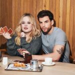 Julia Quinn Instagram - #Polin but make them modern. Seriously, I’ve never seen a photo of @nicolacoughlan and @lukenewtonuk in modern clothes that better captures the vibe of Penelope and Colin. She’s in a comfy sweater, he’s being a little cheeky, and they’ve got snacks!