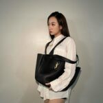 Julia Wu Instagram - 🍂 vintage top, modern bag 🪶 @ysl