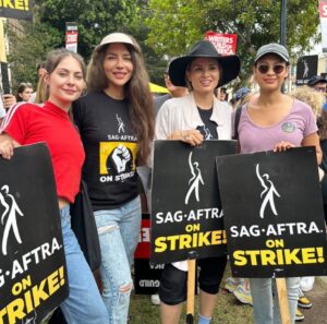 Juliana Harkavy Instagram - So empowering and equally surreal suiting up with my Arrow family to picket outside of WB studios yesterday. Thank you to everyone who came out to show your support!! 🏹💚🪧#sagaftrastrike #wgastrike #sagaftrastrong #wgastrong #teamarrow
