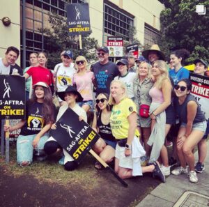 Juliana Harkavy Instagram - So empowering and equally surreal suiting up with my Arrow family to picket outside of WB studios yesterday. Thank you to everyone who came out to show your support!! 🏹💚🪧#sagaftrastrike #wgastrike #sagaftrastrong #wgastrong #teamarrow