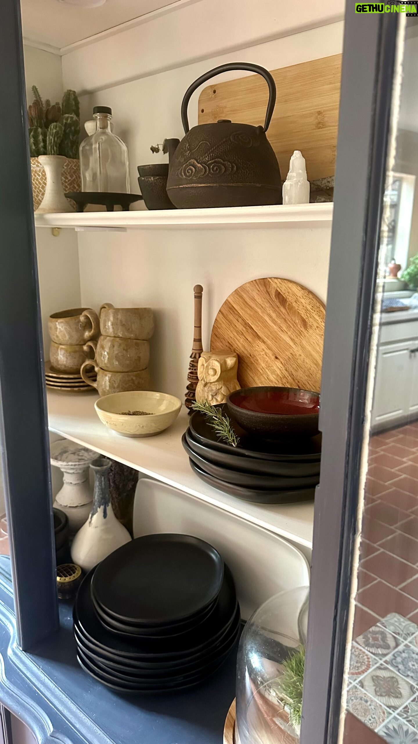 Juliana Harkavy Instagram - Hutch makeover! 🧺🧹 We kept complaining about our lack of storage space, then realized we've had this hutch sitting there as a display case for a few fragile items, just taking up space. I overcame my fear of maximalism and filled her all up... I am SO happy I did. She's so much prettier, cozier, and more practical! #homedecor #vintagedecor #hutchdecor #hutchgang #dininghutchmakeover #cottagecore #diy #homedecorating #thriftedfinds #thriftedhutchdecor #antiquehutch #antiquehutchmakeover #bluehutch #practicallife #cozyvibes #falldecor #fallcleaning #newhutch #homedecorideas #decorinspiration #hutchredo #vintagestyle #cottagecoreaesthetic #cottagecoredecor #apothecary #magnoliahome #tintinstreasures #driedlavender #oldhouses #hutchlove