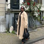 Julie Adenuga Instagram - Pick your own caption: Option 1. I’m genuinely not selling this trench at @collectionsuk - I replaced it with another Burberry jacket 🤷‍♀️ Option 2. I’ve officially been to every Daily Paper store in the world AND their HQ. I need a tatt now. It’s time. Option 3. #FrikanDam