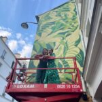 Julie de Bona Instagram - Un petit tour de nacelle avec la sister @olivia_de_bona Work in progress ... Vous pouvez découvrir son mur à partir de dimanche au 38 rue de la roquette Si fière de ma sœur #proudsister Je vous promets, j’ai pas fait exprès d’assortir ma robe @thekooples à son mur 🌳🌳🌳
