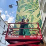 Julie de Bona Instagram - Un petit tour de nacelle avec la sister @olivia_de_bona Work in progress ... Vous pouvez découvrir son mur à partir de dimanche au 38 rue de la roquette Si fière de ma sœur #proudsister Je vous promets, j’ai pas fait exprès d’assortir ma robe @thekooples à son mur 🌳🌳🌳