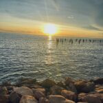 Kabby Hui Instagram – the sun kisses the ocean 🌊🌅