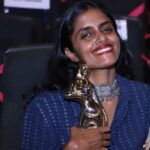 Kani Kusruti Instagram - "അയ്യേ ലിപ്സ്റ്റിക്‌ ഇട്ടൊ?" എന്ന മലയാളി ചോദ്യത്തിനു അറിഞ്ഞു കൊണ്ട്‌ തന്നെ ആണു ലോക പ്രശസ്തയായ 'റിഹാന' എന്ന സിംഗർ സോങ്ങ് റൈറ്ററുടെ 'ഫെന്റിബ്യുട്ടീ' ബ്രാൻറിലെ 'യൂണിവേഴ്സൽ റെഡ്‌ ലിപ്സ്റ്റിക്'‌ ഇട്ട്‌ സ്റ്റേറ്റ്‌ അവാർഡ്‌ പരിപാടിക്ക്‌ പോയത്‌. ആ 'റെഡ്‌ ലിപ്സ്റ്റിക്‌' എന്തിനു നിലകൊള്ളുന്നു എന്ന് ആത്മാർത്ഥ്മായി അറിയാൻ അഗ്രഹിക്കുന്നവർ വായിച്ചു മനസ്സിലാക്കുക. ♥️ Proudly wearing Rihanna s universal red lipstick from fentybeauty for the State award function. ♥️ For people who are genuinely interested in reading what this universal red lip stick stands for , here is an extract from a link 👇🏾 “Historically, darker-skinned black women have been derided for wearing red lipstick. As recently as 2013, the rapper A$AP Rocky, while on tour with Rihanna, was criticized for telling the lifestyle site the Coveteur that “You have to be fair skinned to get away with” wearing red lipstick. The message often is that black women’s lips — a body part that is simultaneously ridiculed and sexualized — are meant to be downplayed, not highlighted with red.” Also wearing an old shirt and trousers of Anand’s. @memewala https://www.google.com/amp/s/www.buzzfeednews.com/amphtml/leticiamiranda/heres-why-rihanna-is-the-perfect-person-to-sell-you-red #fentybeauty #rihanna #stunna