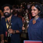Kani Kusruti Instagram - "അയ്യേ ലിപ്സ്റ്റിക്‌ ഇട്ടൊ?" എന്ന മലയാളി ചോദ്യത്തിനു അറിഞ്ഞു കൊണ്ട്‌ തന്നെ ആണു ലോക പ്രശസ്തയായ 'റിഹാന' എന്ന സിംഗർ സോങ്ങ് റൈറ്ററുടെ 'ഫെന്റിബ്യുട്ടീ' ബ്രാൻറിലെ 'യൂണിവേഴ്സൽ റെഡ്‌ ലിപ്സ്റ്റിക്'‌ ഇട്ട്‌ സ്റ്റേറ്റ്‌ അവാർഡ്‌ പരിപാടിക്ക്‌ പോയത്‌. ആ 'റെഡ്‌ ലിപ്സ്റ്റിക്‌' എന്തിനു നിലകൊള്ളുന്നു എന്ന് ആത്മാർത്ഥ്മായി അറിയാൻ അഗ്രഹിക്കുന്നവർ വായിച്ചു മനസ്സിലാക്കുക. ♥️ Proudly wearing Rihanna s universal red lipstick from fentybeauty for the State award function. ♥️ For people who are genuinely interested in reading what this universal red lip stick stands for , here is an extract from a link 👇🏾 “Historically, darker-skinned black women have been derided for wearing red lipstick. As recently as 2013, the rapper A$AP Rocky, while on tour with Rihanna, was criticized for telling the lifestyle site the Coveteur that “You have to be fair skinned to get away with” wearing red lipstick. The message often is that black women’s lips — a body part that is simultaneously ridiculed and sexualized — are meant to be downplayed, not highlighted with red.” Also wearing an old shirt and trousers of Anand’s. @memewala https://www.google.com/amp/s/www.buzzfeednews.com/amphtml/leticiamiranda/heres-why-rihanna-is-the-perfect-person-to-sell-you-red #fentybeauty #rihanna #stunna
