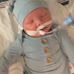 Kara Keough Instagram – You would have been two months old today. You’d have found your favorite pacifier by now, and I’d be grateful that I was finally able to get those first (beautiful) 6  hour stretches of sleep that make me feel like a Disney Princess with birds tweeting above my head. Instead, I’m clocking in 12  hours every night because sleeping is decidedly easier than my waking hours. We should be cleaning up your blowouts, instead we’re dealing with our own shit. At this point, you would be finding your voice – squawking and squealing and making our hearts explode. Our hearts have still detonated, but for different reasons. I should be looking at your face for most of my day, instead I have to search for you elsewhere. I see you in songs, in the sky, in the sea, in your sister’s face, in your daddy’s arms. I’ll keep looking for you for as long as I live. Being without you is hard, but being your mom is one of my favorite things about myself. I love you, McCoy Casey.
