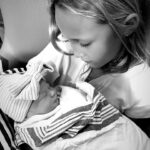 Kara Keough Instagram - “It’s a girl!” Decker announced to an excited room on 11.1.23 at 5:43pm. Baby sister arrived three weeks early like her big brother Vaughn, weighing in at 8lbs 5oz and rocking a full head of dark hair. The first thing I saw was McCoy’s sweet chunky cheeks as we met our newest heaven-sent squish. She came screaming into our hearts and hasn’t stopped squawking since - earning @kyleboz’s best nickname yet: “Squeaks.” I can hear my dad’s voice as he would have said it, so I know it’s just right. Thank you to our birth team @fullcirclejax @4thtrimesterfitnessmethod for the most dreamy induction a girl could ask for - starting with a foley bulb comfy enough to trick-or-treat in (I went as Wonder Woman obviously) and ending with a hasty labor tub transition. The cherry on top was holding hands with Decker the Doula/Birth Photographer-In-Training as I brought her longest held wish earth-side: a baby sister. So many people prayed fiercely over this birth and we are seeping with gratitude that we got exactly what we prayed for: to bring our baby home. If you need me, I’ll be thanking God and pinching myself savoring the magic of Stetson Lou Bosworth.