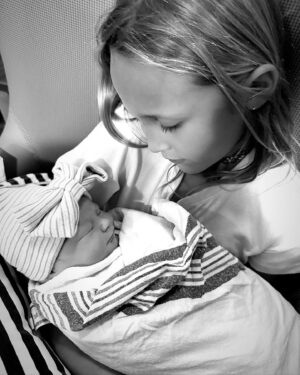 Kara Keough Instagram - “It’s a girl!” Decker announced to an excited room on 11.1.23 at 5:43pm. Baby sister arrived three weeks early like her big brother Vaughn, weighing in at 8lbs 5oz and rocking a full head of dark hair. The first thing I saw was McCoy’s sweet chunky cheeks as we met our newest heaven-sent squish. She came screaming into our hearts and hasn’t stopped squawking since - earning @kyleboz’s best nickname yet: “Squeaks.” I can hear my dad’s voice as he would have said it, so I know it’s just right. Thank you to our birth team @fullcirclejax @4thtrimesterfitnessmethod for the most dreamy induction a girl could ask for - starting with a foley bulb comfy enough to trick-or-treat in (I went as Wonder Woman obviously) and ending with a hasty labor tub transition. The cherry on top was holding hands with Decker the Doula/Birth Photographer-In-Training as I brought her longest held wish earth-side: a baby sister. So many people prayed fiercely over this birth and we are seeping with gratitude that we got exactly what we prayed for: to bring our baby home. If you need me, I’ll be thanking God and pinching myself savoring the magic of Stetson Lou Bosworth.