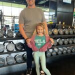 Kara Keough Instagram - Teaching our girl how to 8-clap and what being a @UCLA #Bruin means to us! A special thanks to @uclafootball for taking the time to give us an impromptu tour of the @wasserman Football Center 🐻