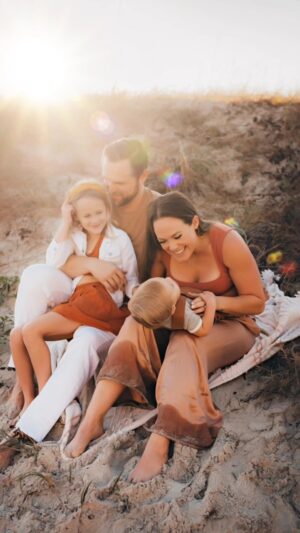 Kara Keough Instagram - The year McCoy died, I didn’t send out a holiday card. Couldn’t. The idea of our family pictured without him crushed me. Feeling like I’d stolen something from Decker’s childhood by freezing our family traditions, I decided to continue with a holiday card in 2021. By that time, I’d figured out a way to continue our holiday tradition in a way that could both honor our boy and hold space for him. His name is on our card; he is a part of our family - for always. There will be a blue heart on our cards each year. Can you spot the other ways I brought McCoy to our family photo shoot? And can you spot the ways he showed up for us? 💙 🦋🌈☀️✨