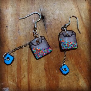 Karen Olivo Instagram - My kid, the amazing @madisonuphoff ,
made these earrings. 😃🧡😃💛😃