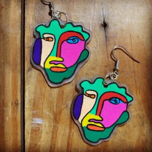 Karen Olivo Instagram - My kid, the amazing @madisonuphoff ,
made these earrings. 😃🧡😃💛😃