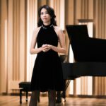 Karen Mok Man-Wai Instagram - 時光荏苒，但願我們對音樂的愛、對生活的愛，每一天都是新的💖 Embracing the fleeting moments, let our love for music and life be a fresh melody every day. 💫 👗 @shiatzychen 💇‍♀️ @carrcheng 💄 @lingchan_makeup 📸 @janshenphoto #莫文蔚 #KarenMOK #piano