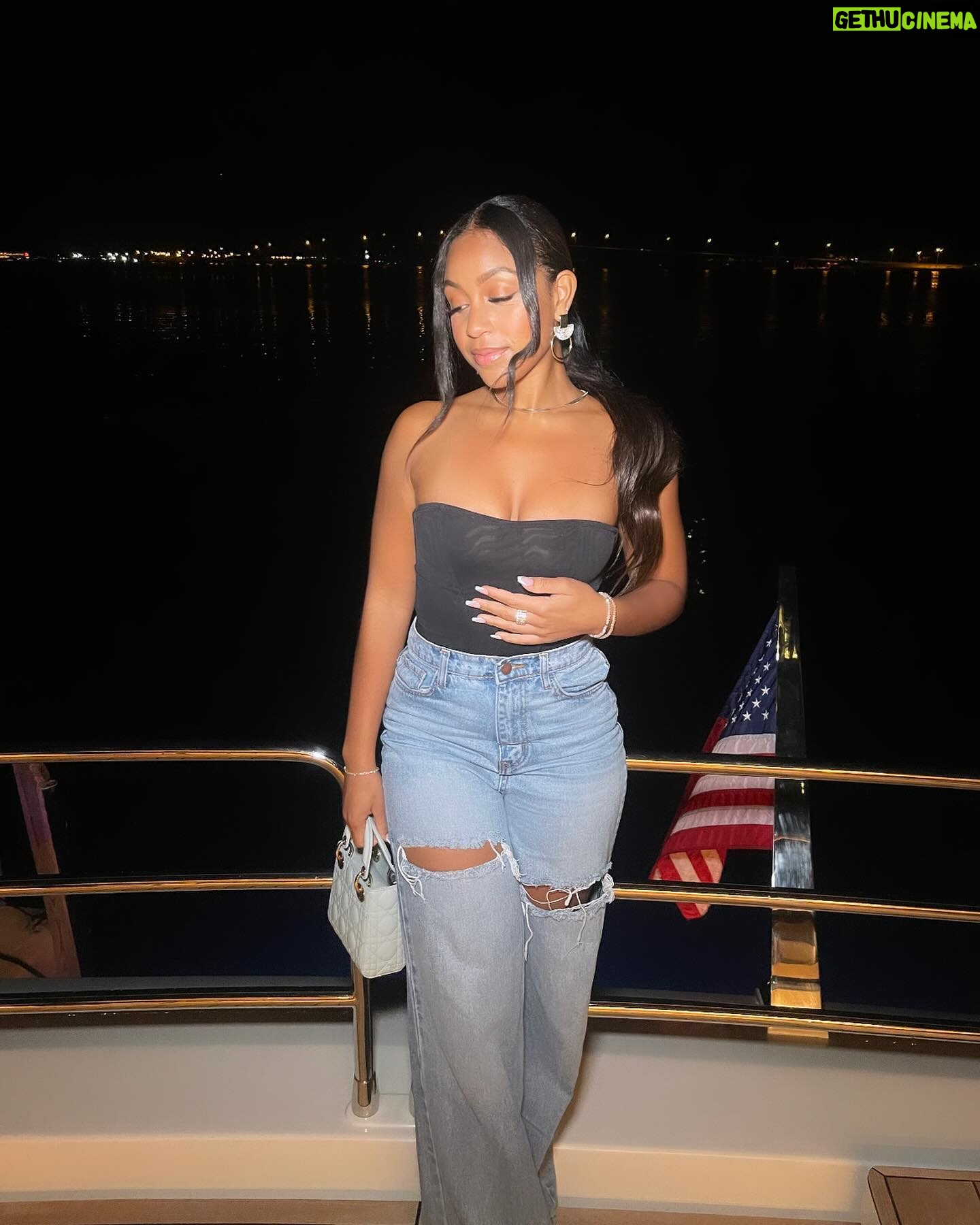Karma Bridges Instagram - Just a girlll🥂☁️🌙🪩🫶🏽