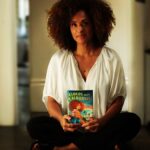 Karyn Parsons Instagram - Today is the day!!! #CloudsOverCalifornia is out! 📘⛅️🛼🌴🥰 Woohoo!!! 🤸🏽‍♀️🤸🏽‍♀️🤸🏽‍♀️ Thx, @littlebrown , @penguinrandomhouseuk and @geraldmarc ❤️ I hope you’ll grab a copy! (Link in bio) Photo: 📷 @cathrinewhite