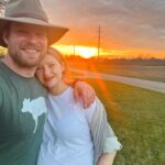 Kassandra Clementi Instagram - I’d firstly like to state that fortunately for my midline and uterus, these pictures are old. We got ENGAGED 💍 just over a year ago. Dan was fresh from a rescue covered in goat shit, I was waddling like I swallowed a ford focus, I had also drooled on my shirt during a recent nap, the sunset was beautiful (hallelujah for something nice), it was perfect and perfectly us. We’ve said “we should start planning a wedding” and gestured around vaguely at least once a week with no follow through because that bulbous belly is now a giggling, crawling, center of our universe who is better than everyone you know and who has the time.