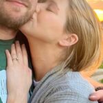 Kassandra Clementi Instagram - I’d firstly like to state that fortunately for my midline and uterus, these pictures are old. We got ENGAGED 💍 just over a year ago. Dan was fresh from a rescue covered in goat shit, I was waddling like I swallowed a ford focus, I had also drooled on my shirt during a recent nap, the sunset was beautiful (hallelujah for something nice), it was perfect and perfectly us. We’ve said “we should start planning a wedding” and gestured around vaguely at least once a week with no follow through because that bulbous belly is now a giggling, crawling, center of our universe who is better than everyone you know and who has the time.