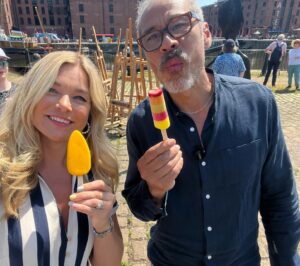 Kate Bryan Instagram - Sky Arts Ice Cream on Location of the year. 🍦 
What a banging day last summer with the good people of Liverpool. Another talented bunch of artists in the pods and well SPF’ed wildcard artists. Yes there were ice creams all round and lots of posing with parasols but it was also a fierce competition and I work very hard ok?! 

Join us at Liverpool docks tonight on Sky Arts at 8pm. 
#laoty #landscapeartistoftheyear #liverpooldocks #tateliverpool thanks to @liz.makeup.11 for keeping me powdered and sun safe ☀️ xxx