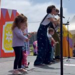 Kate Micucci Instagram - Been meaning to post about Bob Baker Day. I had a blast hosting the kids talent show. Everyone rocked that stage! Thanks to all who came out to experience the magic that is @bobbakermarionettes. Also it really felt like a mini Coachella with puppets. So much fun! Photo by @bradstubbsfaceplace