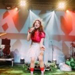 Kate Nash Instagram – London, Earth! Wow! Thank you for an incredible evening! And thank you for being part of my community 💓 This is such an exciting moment for me, to have overcome so much in my music career, gotten to the top of this laborious climb for a moment where I’m able to dream & plan & be creative in new ways. I am so excited and grateful. I wouldn’t change the journey because look what we have for it. Feelin lucky & excited cause if you think that was fun I HAVE SO MUCH MORE PLANNED FOR KOKO MWAHAHAHAHA 🕷️ Thank you to my team who worked so hard to make this magic happen !! Photos @dorapaphides my Art Team!! @athenapaginton who made all our glittery magical sculpture dreams come true!! @paulatrounce lights & window entrance magic Spinny thing!! GRASS!! @lewisleft on sound! @woolymamothsounds secret intro sneaky theatrical tracks! With surprises from @eteka_huckaby & @aliciataylorwwe @discordo.studio for helping us with Art & Design!! Alex on merch! My Band! Guitar Hero @boomvision Bass Legend @wanderingtheshires Drums to MAXIMUM ROCK CAPACITY @maxieplaysdrums String & Overture arrangements & Piano & conducting! @jmaryondavies 👏 Our incredible string department @herensemblemusic @ellieconsta @blaizehenry_ @georgiedavism9 @rayofsun07 @meera_priyanka_cello My CREW! Andy! @gr33bmaster Emma! TM Mr Long! Smooth Management legends! @katbiglife & @danalandman Styling Icon! @rionhannora wearing @maximilianraynor Hair Genius @evanhuang.33 Make Up Queen! @oonahmakeup And support from Miss Power herself @itsconniesworld My iconic Label @killrockstarsofficial thank you for being there!! Ollie my radio plugger! My amazing agent @jamiexray @iknoeaguy and @frederikthaae producer of 9 Sad Symphonies flew in for the night!! I have the best team and I feel so proud to say that. Thank you all for all of your hard work! What a night! 🖤