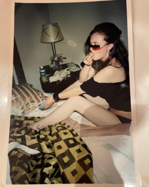 Katharine Isabelle Instagram - Circa 2003. Hotel room. MTL. Mixtape CDs, hand written song titles, maple syrup, knitting. Friend found this pic in their basement A  #tbt