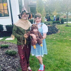 Katherine Bailess Instagram - Halloween 2023 with our little Toto! 🎃🐶 #miles #4months #first Halloween #wizardofoz #dorothy #scarecrow