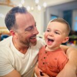 Katherine Barrell Instagram - Happy Father’s Day to all of you fathers and father figures out there! Special love to Papa Paul, “Ampa Hawold” (grandpa Harold) and, of course, Ray- who fills our home with so much love and mischievous laughter!! @raygalletti , Ronin is SO lucky to grow up with a Daddy who is equal parts silly and sensitive and gives everything to his family. You were absolutely made to be a parent and we love you so much!! I am blessed to share this adventure with you! And Bernie says “thank you daddy for always making special trips to pick up my favourite foodies, giving me ear scratches and trimming my grinch-paws into “new shoes” “. Also sending love to everyone out there for whom days like this can be very difficult. Wrapping you in a big hug ❤️