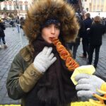 Kathryn McCormick Instagram – Prague!!!! Made it to the Christmas Markets and had to have some chips on a stick! Whatttt!?! So fun!🎄