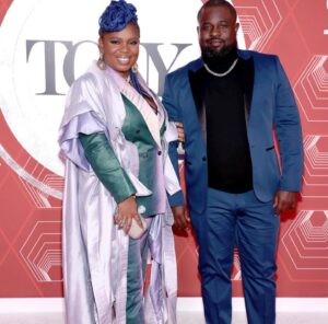 Katori Hall Instagram - THROWBACK ALERT - The 75th @thetonyawards will return back to its usual summer time venue @radiocitymusichall tonight.

Last year’s awards ceremony occurred during a worldwide pandemic that plunged Broadway into an unprecedented  intermission of 18 months. 

The 74th TONYs was historical for a lot of reasons but mostly because finally we could all be in the same room and breathe the same air again (masked of course).

My musical @tinabroadway got 12 noms with one of the best performers in the world @adriennelwarren taking home our singular nod. Her win was all of ours.  And though our show will sadly be closing soon due to a box office crippled by the still raging pandemic, I am overjoyed by the success of my friends nominated this weekend. From @lynnnottage to my sis @domorisseau, I just had to be in that room as Broadway tries to come back better.

Here’s some snaps from that historical night last September. Enjoy!

Styled by @icontips
Suit | @Grayscaleic
Cape | @charlesandron
Jewelry | @chanelofficial 
Purse | @jimmychoo
Masks | @we_evolvetogether   @henrymasks 

MUA | @thetarataylor 
Nails | @imnails
Braids | @samautumnn
Hair styling | @nikiyamathis
📸 @ncovrt 

PR | @teamID