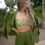 Katrina Scott Instagram - Featuring the Saguaro Green palazzo pants and desert blazer in 100% linen🌵 We custom color-matched the most incredible linen to this beautiful cactus to be a true saguaro color. My favorite part is how chic and flattering the waistband is with pleats in the front and elastic in the back, giving you the perfect darts around your silhouette while still feeling relaxed. I can’t wait to see them on you! Shop these sets and swimsuits on KSLthelabel.com (link in my bio @katrinascott) Thank you for your support and love for this collection! It’s been really fun to create for you. 💚 Photography locally in AZ - @jenniferperkins.co Makeup artist - @lyndsayzmakeup Accessories with @sarahberanstyle @houseofolia @brunathelabel @mirandafrye