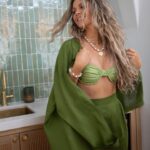 Katrina Scott Instagram - Featuring the Saguaro Green palazzo pants and desert blazer in 100% linen🌵 We custom color-matched the most incredible linen to this beautiful cactus to be a true saguaro color. My favorite part is how chic and flattering the waistband is with pleats in the front and elastic in the back, giving you the perfect darts around your silhouette while still feeling relaxed. I can’t wait to see them on you! Shop these sets and swimsuits on KSLthelabel.com (link in my bio @katrinascott) Thank you for your support and love for this collection! It’s been really fun to create for you. 💚 Photography locally in AZ - @jenniferperkins.co Makeup artist - @lyndsayzmakeup Accessories with @sarahberanstyle @houseofolia @brunathelabel @mirandafrye