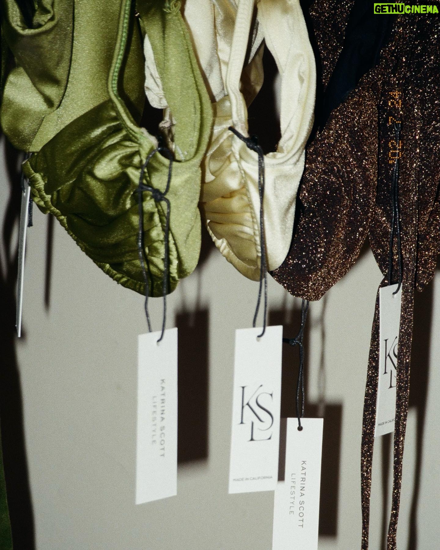 Katrina Scott Instagram - a desert night on film 🎞️ @ksl.thelabel I can’t wait for you to see and feel these chic fabrics in person 🤤 The desert night fabric is a Brazilian tricot dipped in gold shimmer— it’s the most beautiful bronze. The Adobe sunshine and agave green are buttery soft and so luxe. You’ll feel amazing in them ✨ Shop your favorite styles at KSLthelabel.com Made by women in LA 15% profits benefit the @babyquestgrants foundation 📸 @jasminemariefilms
