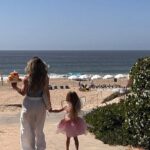 Katrina Scott Instagram - Isabelle is five 🥹🫶🏼 Is it normal to be this emotional about our children turning 5? It’s been half a decade, but it feels like yesterday that she was born. Somehow, I don’t remember what life was like without her. Being a mother has opened my eyes to the constant shift of life— starting anew with each season, while learning true acceptance of time and growth. While there is no manual on motherhood, we do have our hearts to guide us through each chapter. The greatest lesson has been adjusting to change— our children blossom right before our eyes. It’s up to us to get to know them, listen to their little voices, give them space to explore and discover the world, while being their safe home to come back to. It is an absolute privilege to be part of Isabelle’s life and to witness her grow into herself. 🦋 The most beautiful part about her is that she encourages everyone around her to be brave (“anyways you can do it”) while still taking courageous steps in her own life. She reminds me to do the same. 🤍 Cheers to 5 Isabelle 💫 Thank you for all the sweet messages this week. It means the world to be on this journey together! And thank you to our friends and family for celebrating with us on the beach.🥂 Huge thank you to @thepicnic.collective for making her enchanted fairy picnic come to life. 🧚 It was beyond magical and something she’ll never forget. 🙏🏼 #motherhood #5thbirthday #5thbirthdayparty #fairyparty #motherhoodrising #motherhoodjourney