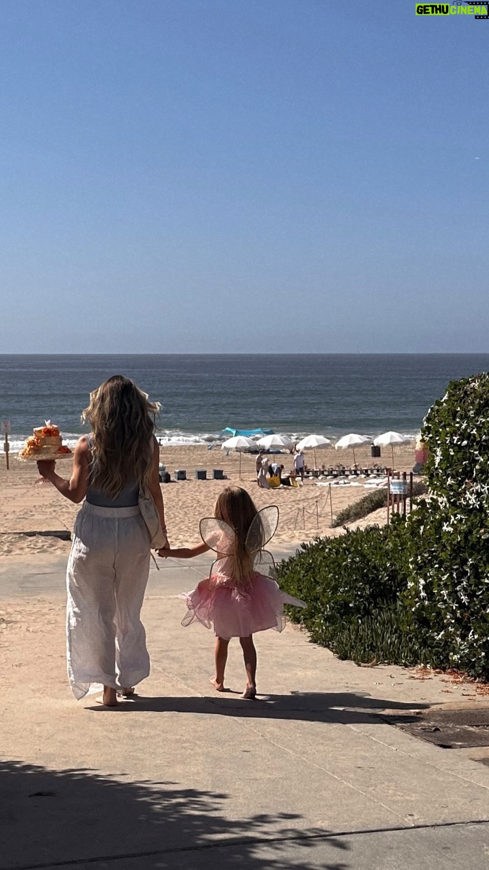 Katrina Scott Instagram - Isabelle is five 🥹🫶🏼 Is it normal to be this emotional about our children turning 5? It’s been half a decade, but it feels like yesterday that she was born. Somehow, I don’t remember what life was like without her. Being a mother has opened my eyes to the constant shift of life— starting anew with each season, while learning true acceptance of time and growth. While there is no manual on motherhood, we do have our hearts to guide us through each chapter. The greatest lesson has been adjusting to change— our children blossom right before our eyes. It’s up to us to get to know them, listen to their little voices, give them space to explore and discover the world, while being their safe home to come back to. It is an absolute privilege to be part of Isabelle’s life and to witness her grow into herself. 🦋 The most beautiful part about her is that she encourages everyone around her to be brave (“anyways you can do it”) while still taking courageous steps in her own life. She reminds me to do the same. 🤍 Cheers to 5 Isabelle 💫 Thank you for all the sweet messages this week. It means the world to be on this journey together! And thank you to our friends and family for celebrating with us on the beach.🥂 Huge thank you to @thepicnic.collective for making her enchanted fairy picnic come to life. 🧚 It was beyond magical and something she’ll never forget. 🙏🏼 #motherhood #5thbirthday #5thbirthdayparty #fairyparty #motherhoodrising #motherhoodjourney